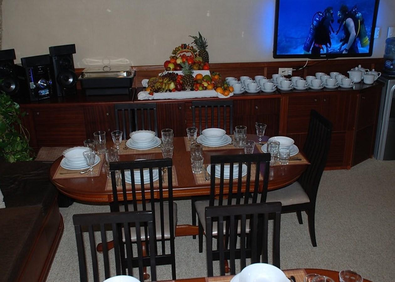 a table with plates and glasses on it aboard 36 M YATCH Yacht for Sale