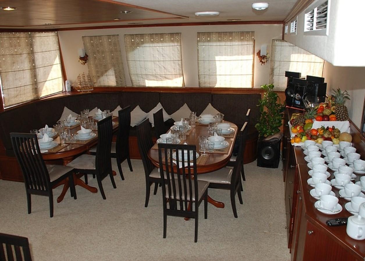 a dining room with a table and chairs aboard 36 M YATCH Yacht for Sale