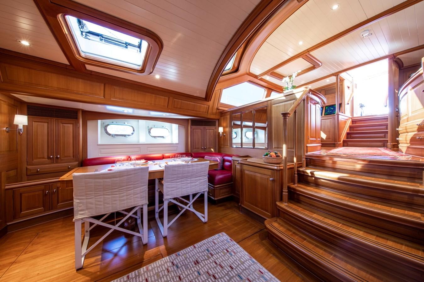 a room with wood floors and wood walls aboard LEGEND Yacht for Sale