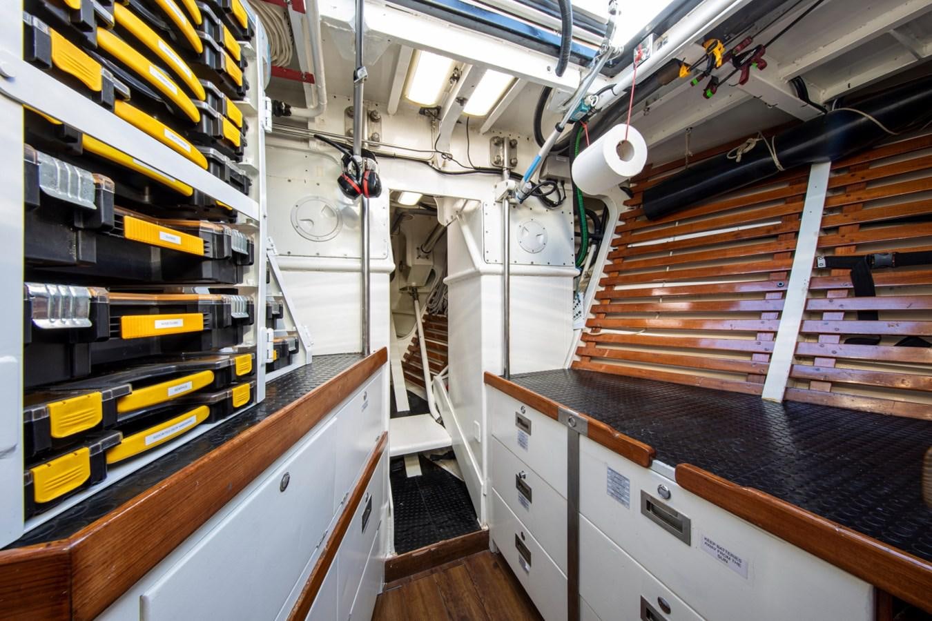 a room with shelves and equipment aboard LEGEND Yacht for Sale