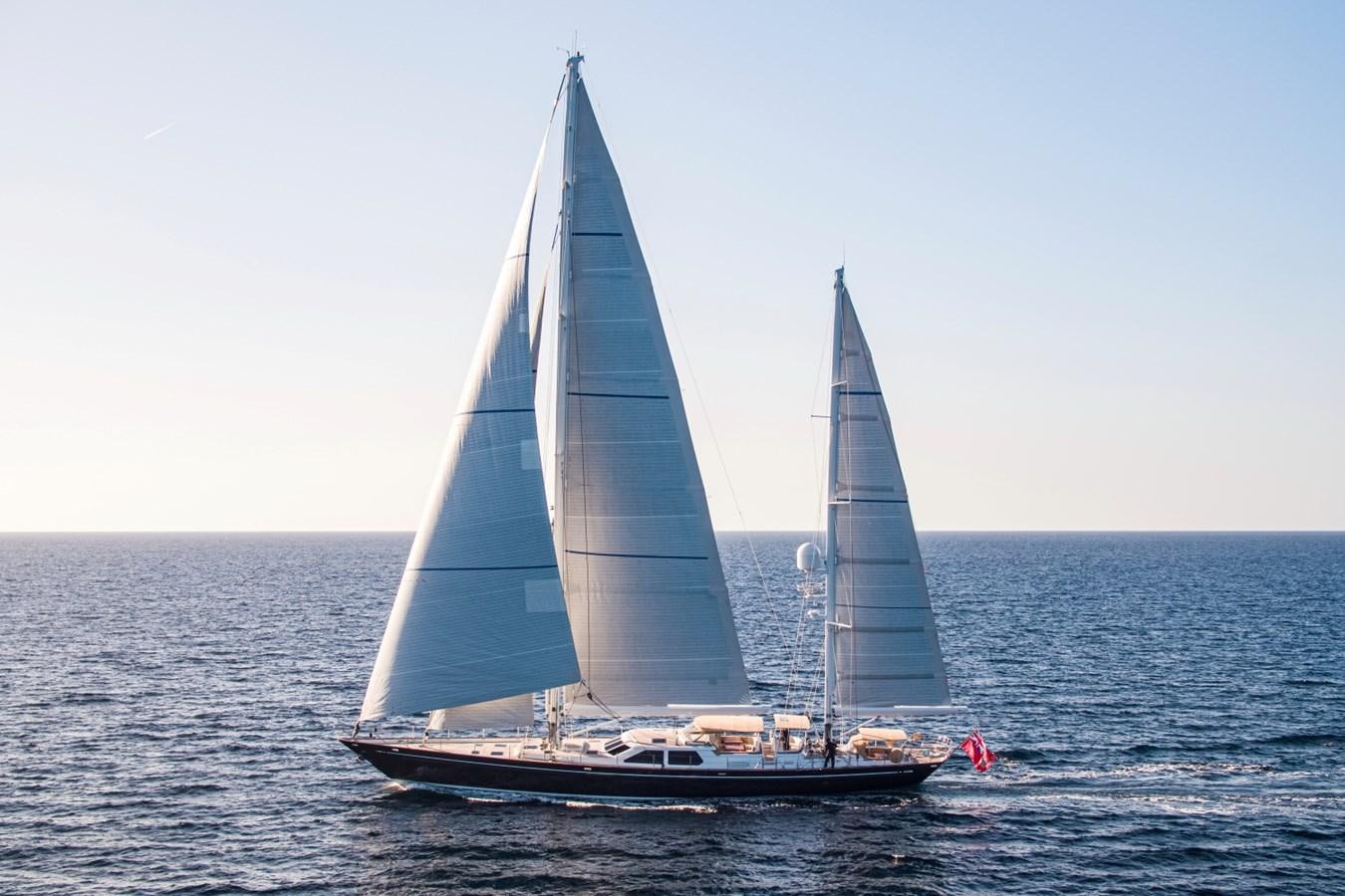 a sailboat in the water aboard LEGEND Yacht for Sale