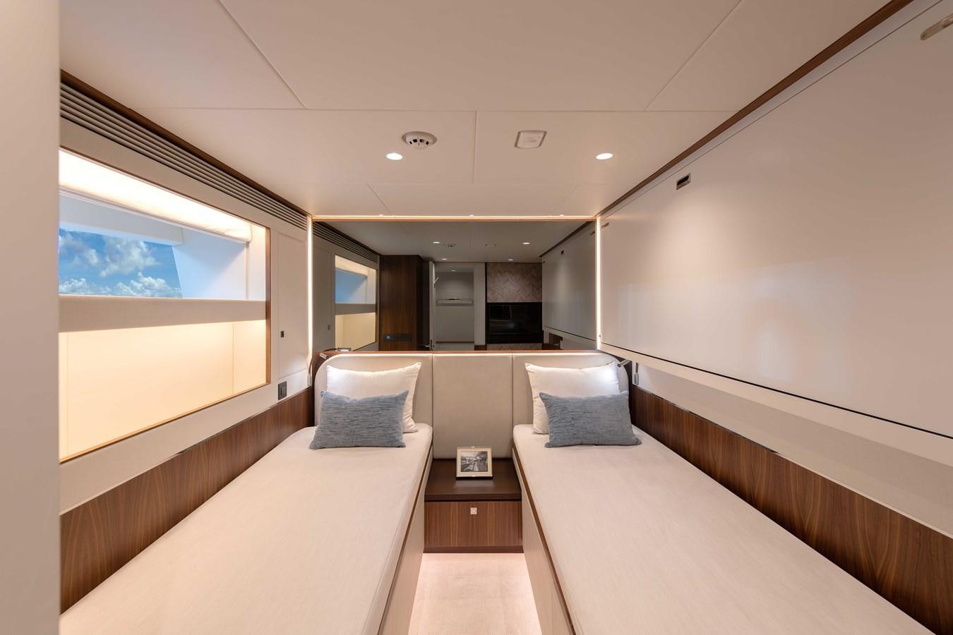 a room with a large window aboard HORIZON FD100/911 Yacht for Sale