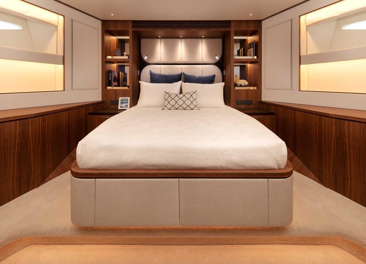 a bed in a room aboard HORIZON FD100/911 Yacht for Sale