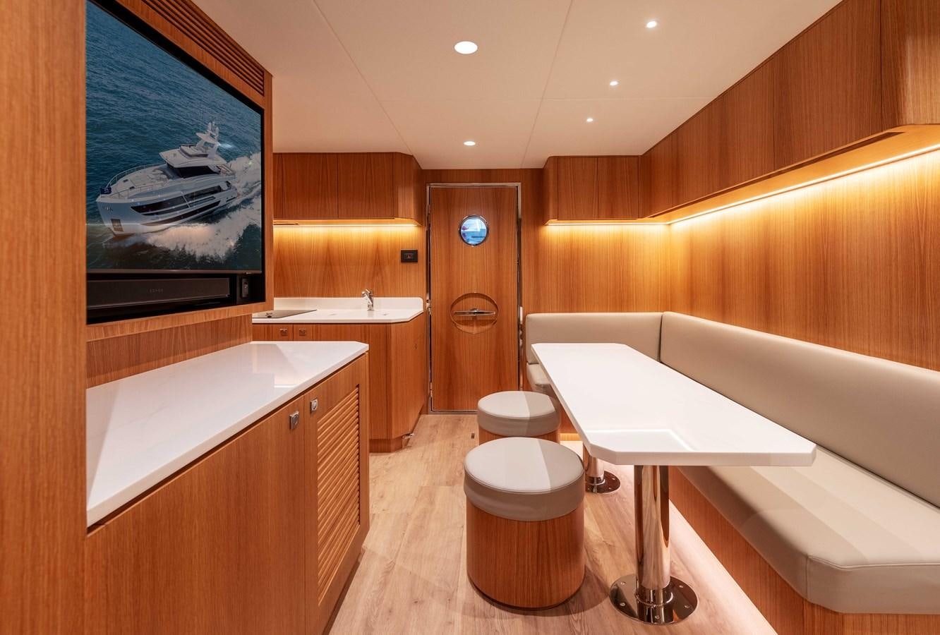 a bathroom with a large mirror aboard HORIZON FD100/911 Yacht for Sale