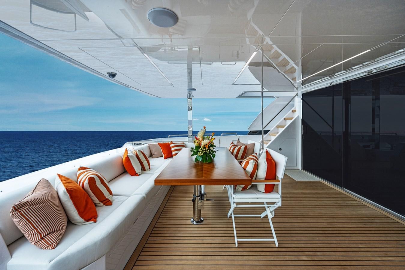 a room with a table and chairs aboard FD75-709 / NOW AVAILABLE Yacht for Sale