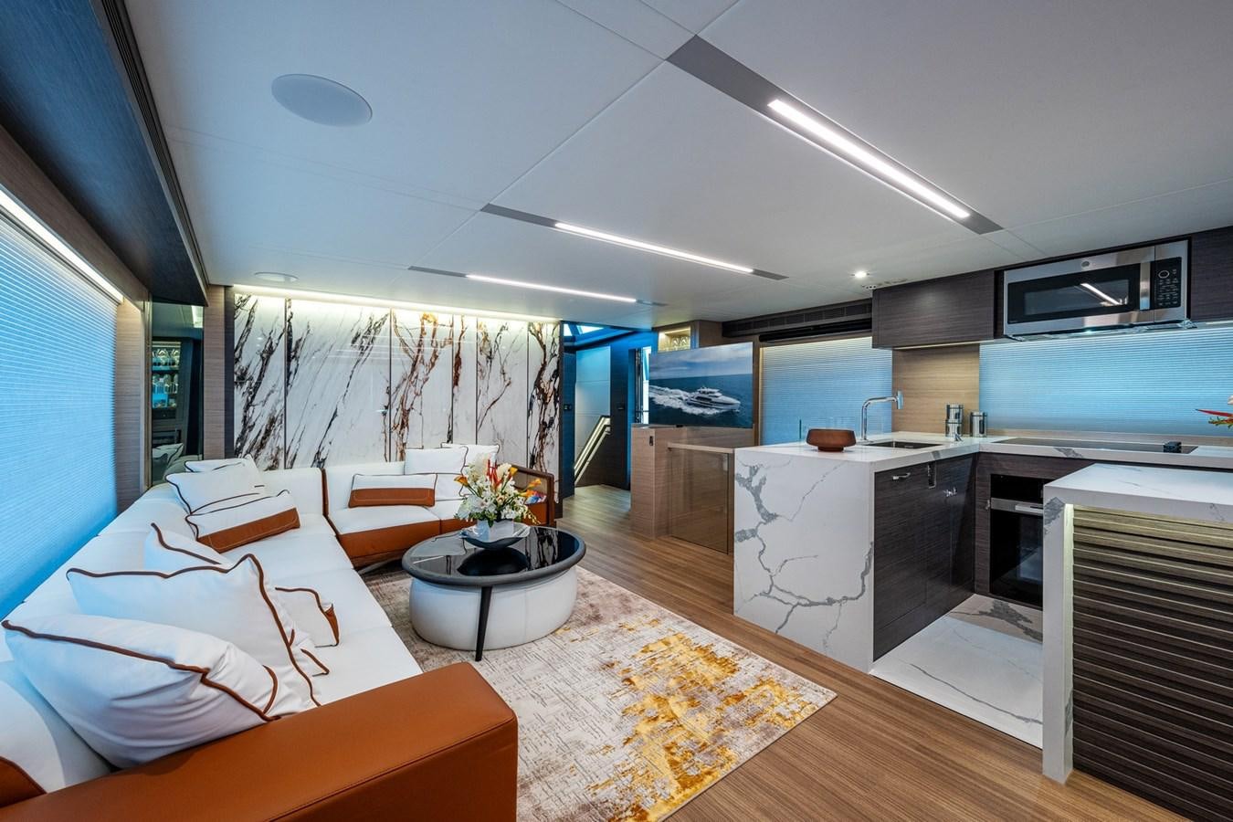 a modern looking bedroom with a large open floor plan aboard FD75-709 / NOW AVAILABLE Yacht for Sale