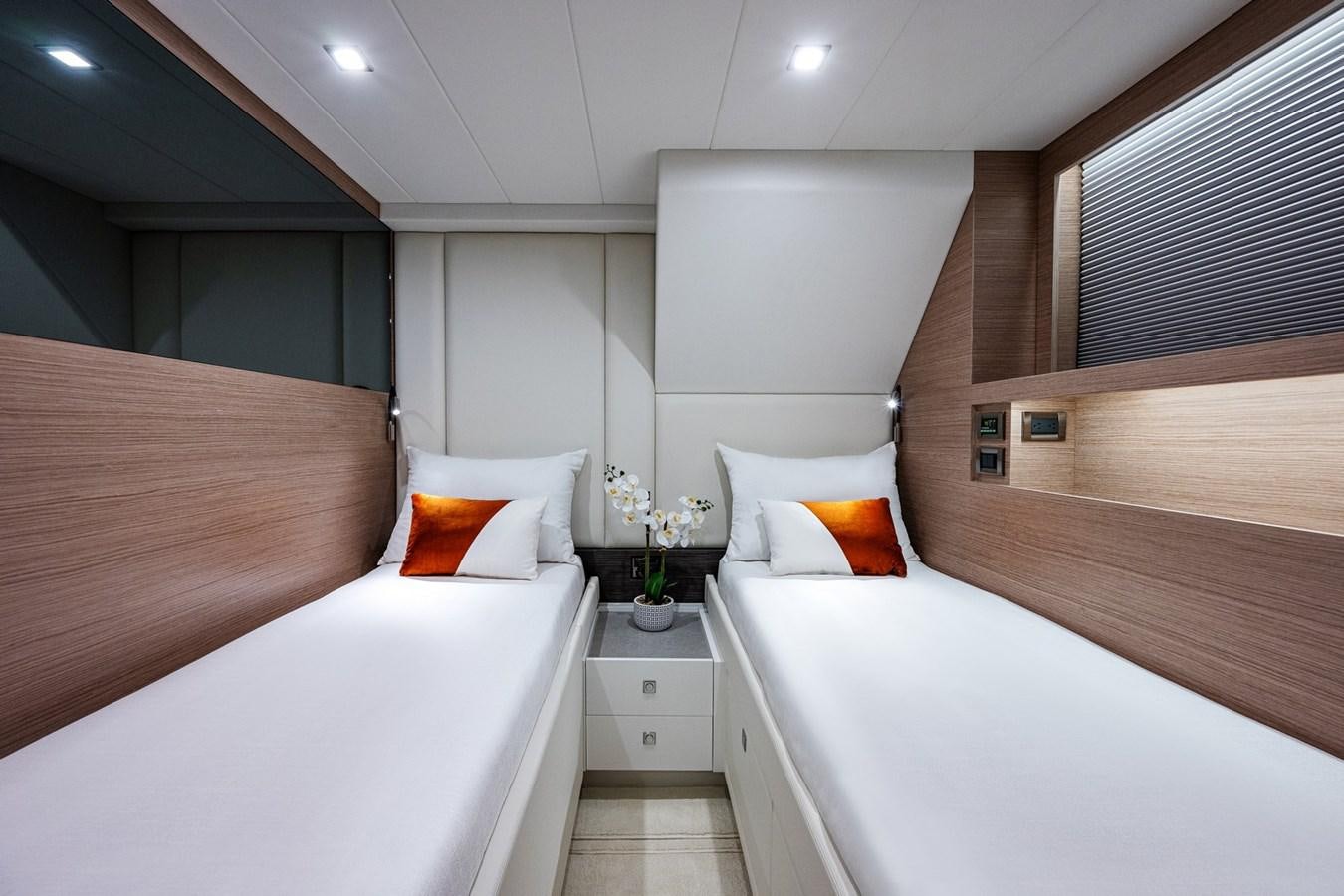 a room with a bed and a desk aboard FD75-709 / NOW AVAILABLE Yacht for Sale