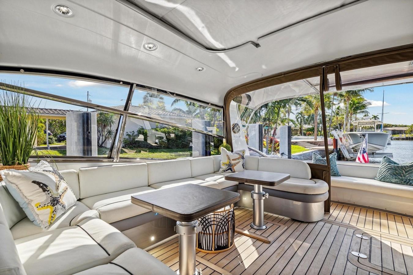 a living room with a large window aboard ALCHEMY Yacht for Sale