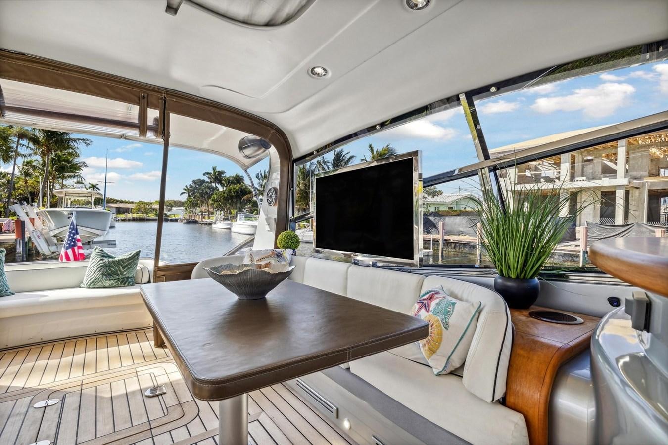 a living room with a large window aboard ALCHEMY Yacht for Sale