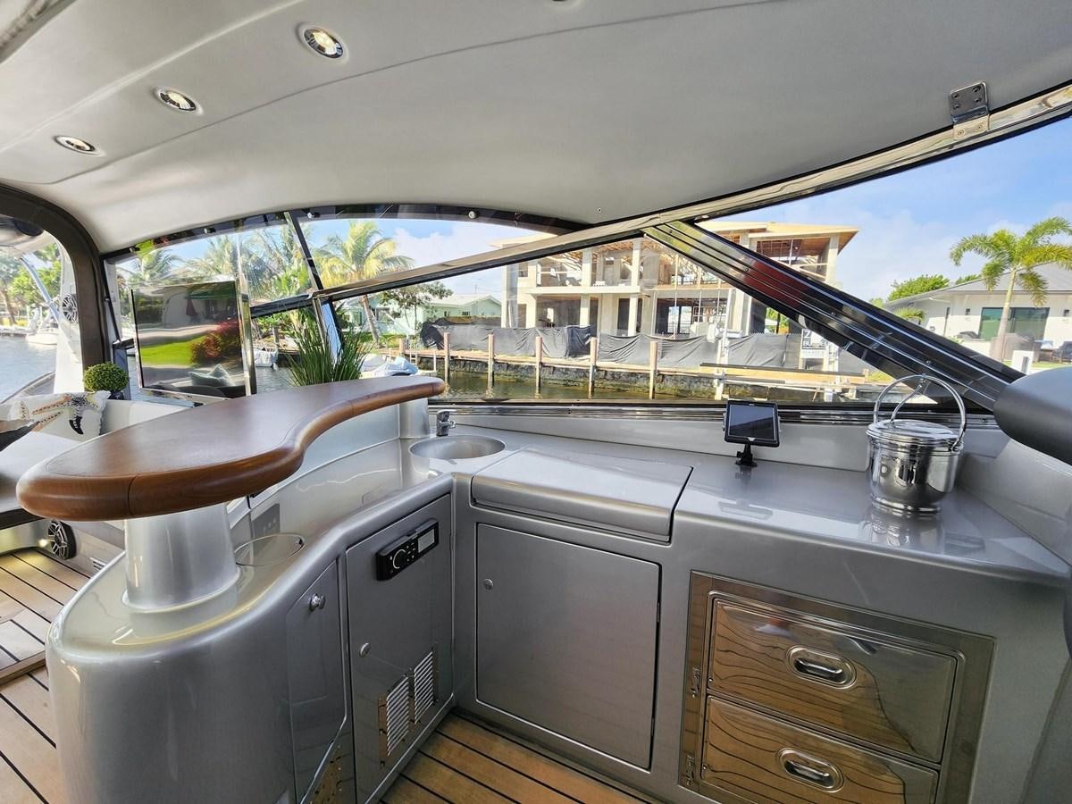 a kitchen with a large window aboard ALCHEMY Yacht for Sale