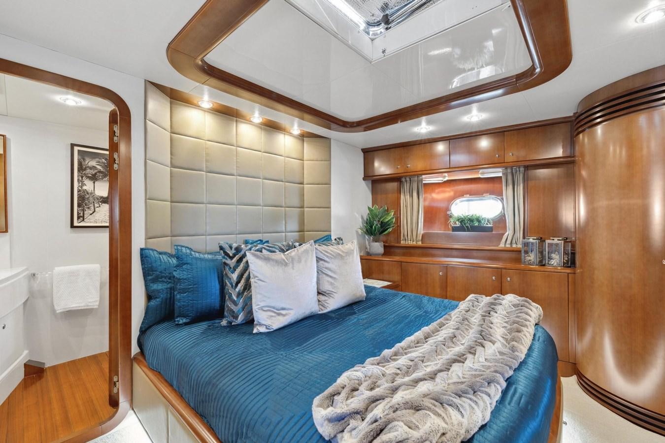 a bed in a room aboard ALCHEMY Yacht for Sale