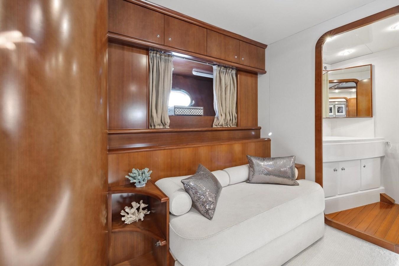 a bed in a room aboard ALCHEMY Yacht for Sale