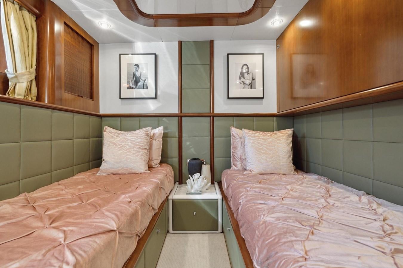 a couple of beds in a room aboard ALCHEMY Yacht for Sale
