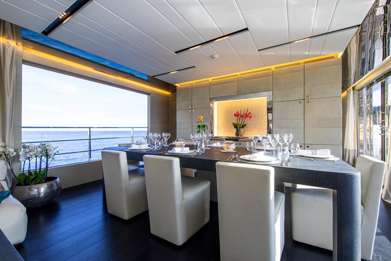 a large kitchen with a large table aboard CINQUANTA-50 Yacht for Sale