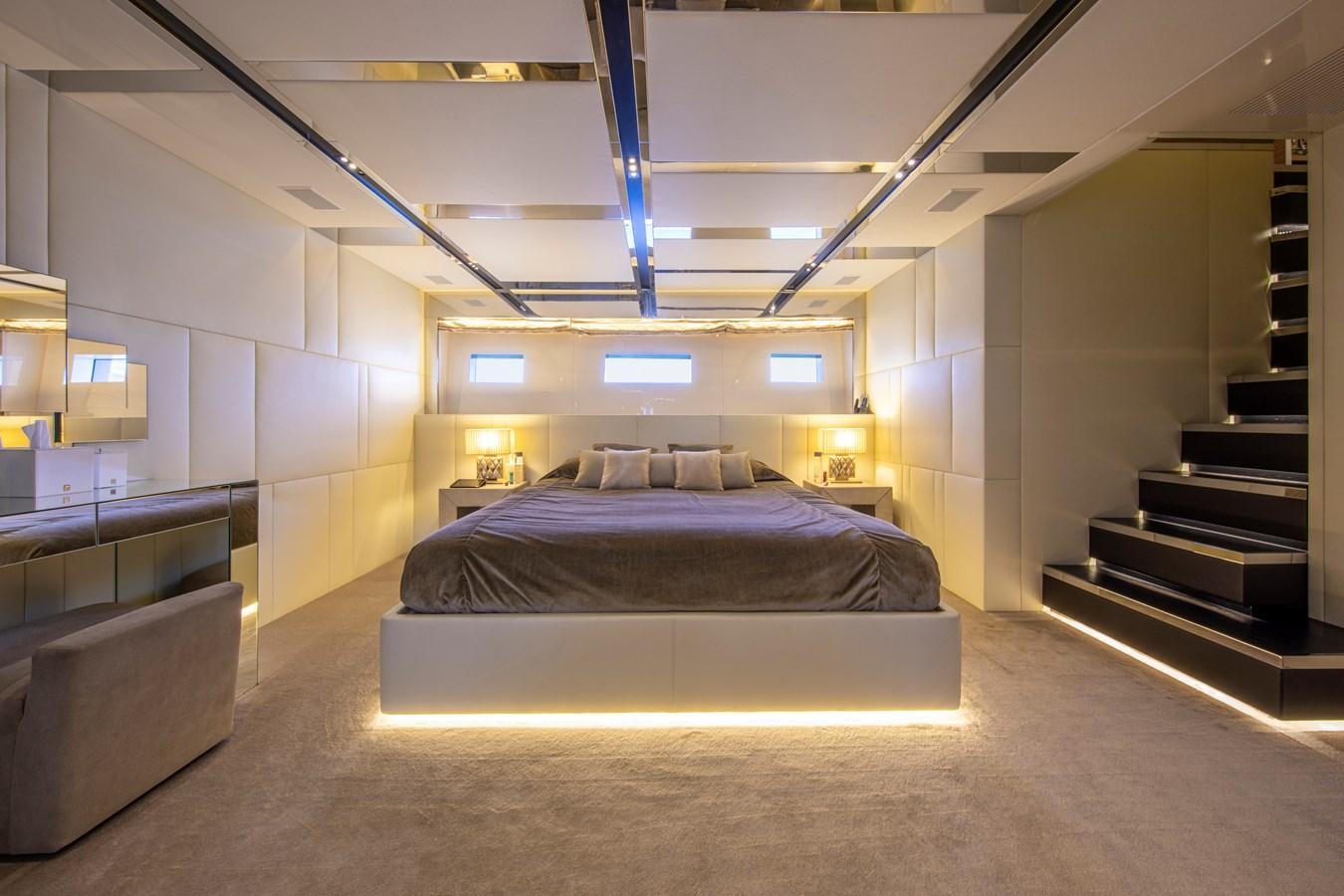 a large bedroom with a bed aboard CINQUANTA-50 Yacht for Sale