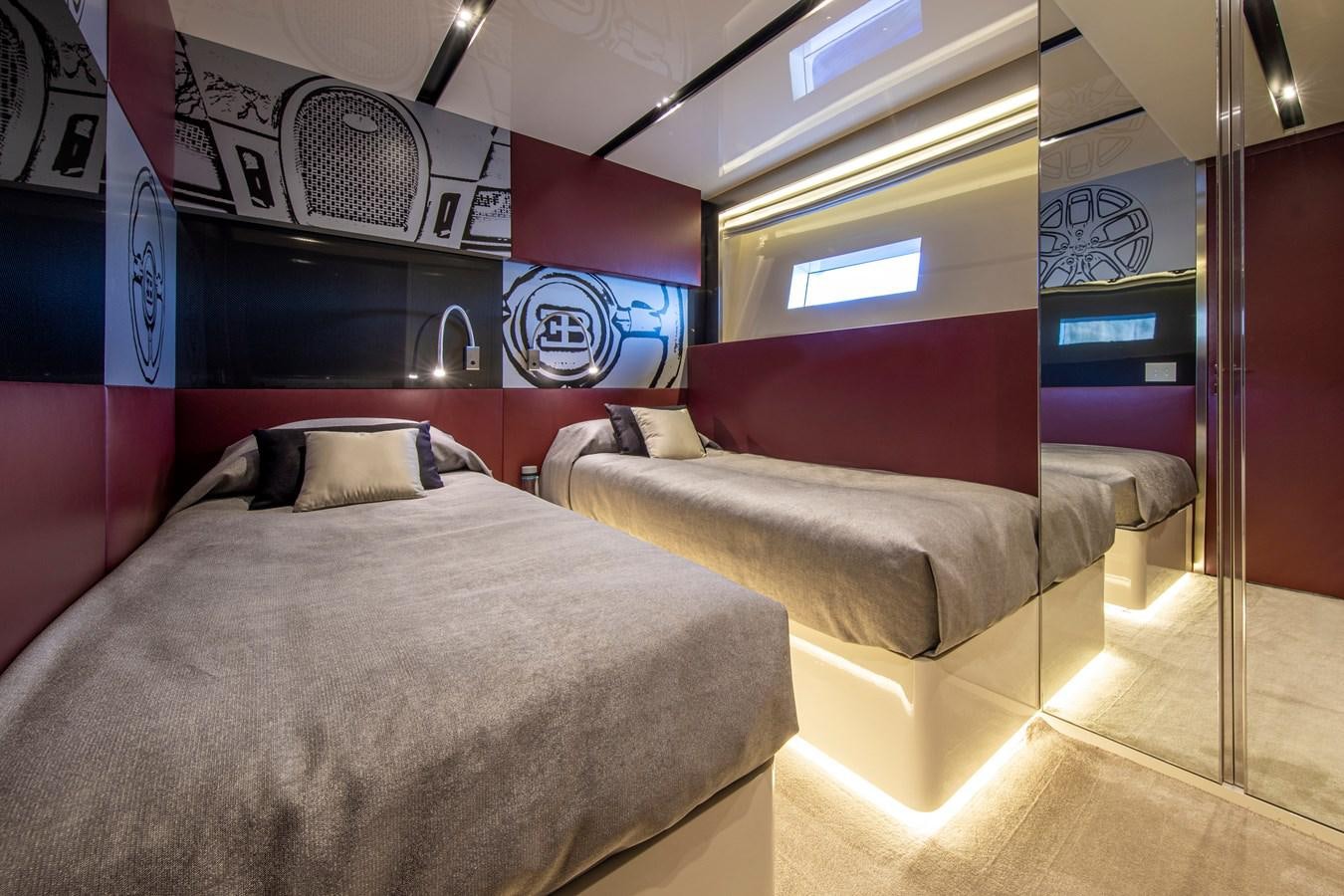 a room with beds and a window aboard CINQUANTA-50 Yacht for Sale