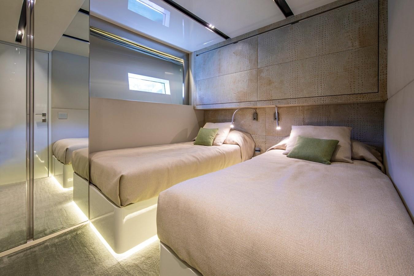 a room with two beds aboard CINQUANTA-50 Yacht for Sale