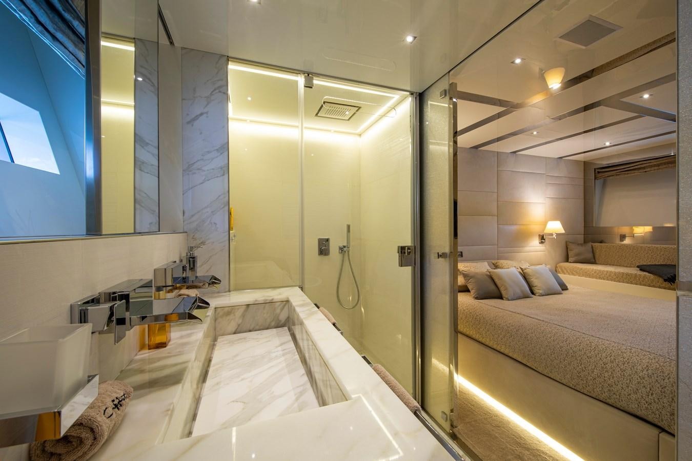 a room with a bed and a sink aboard CINQUANTA-50 Yacht for Sale