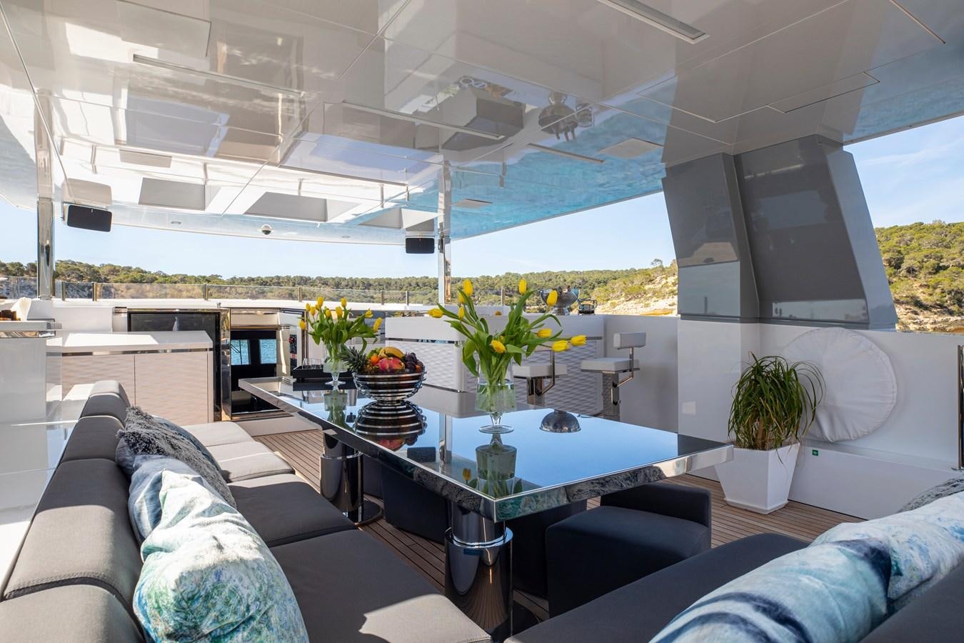 a room with a table and chairs aboard CINQUANTA-50 Yacht for Sale