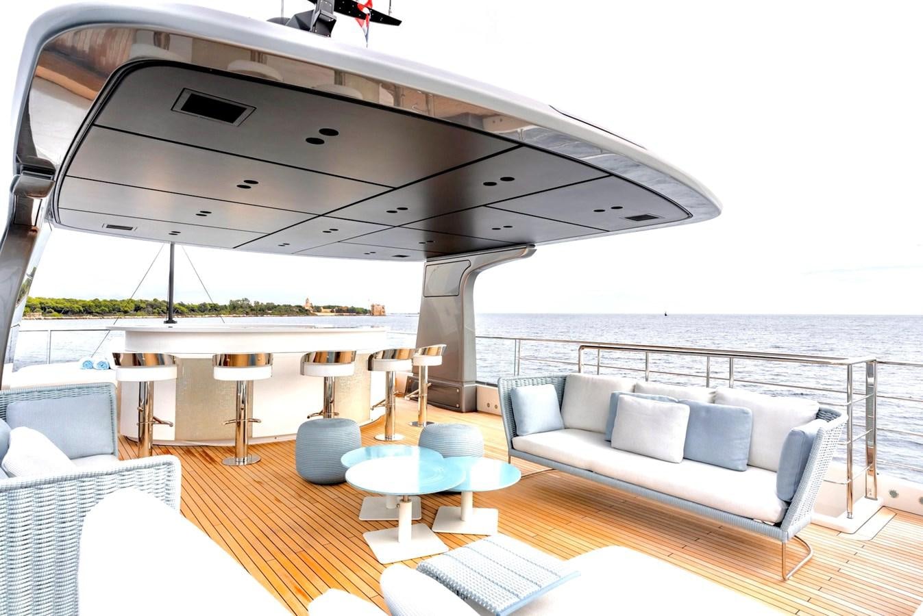 a living room with a large patio aboard TOGETHER Yacht for Sale
