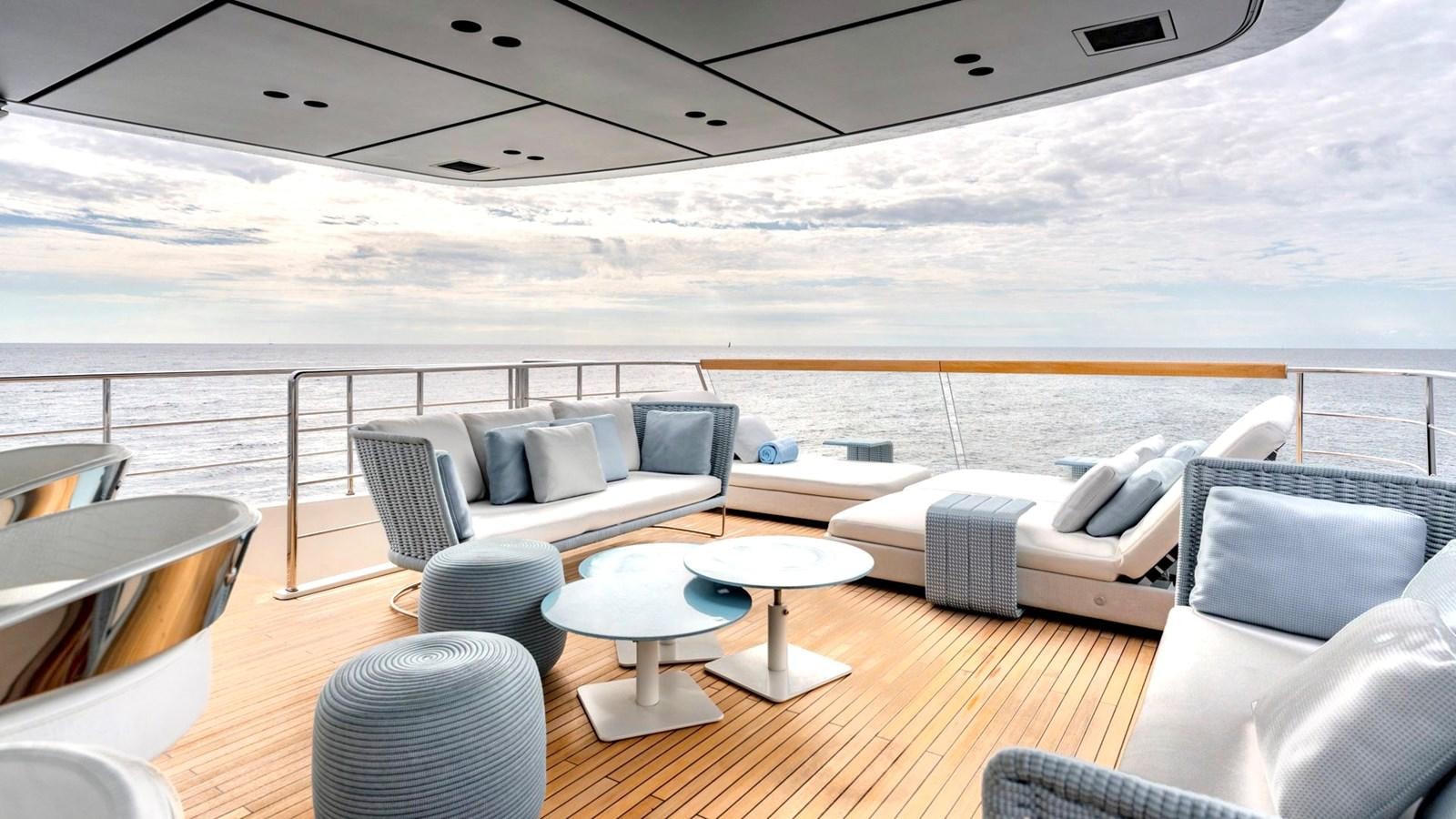 a large living room with a large balcony aboard TOGETHER Yacht for Sale