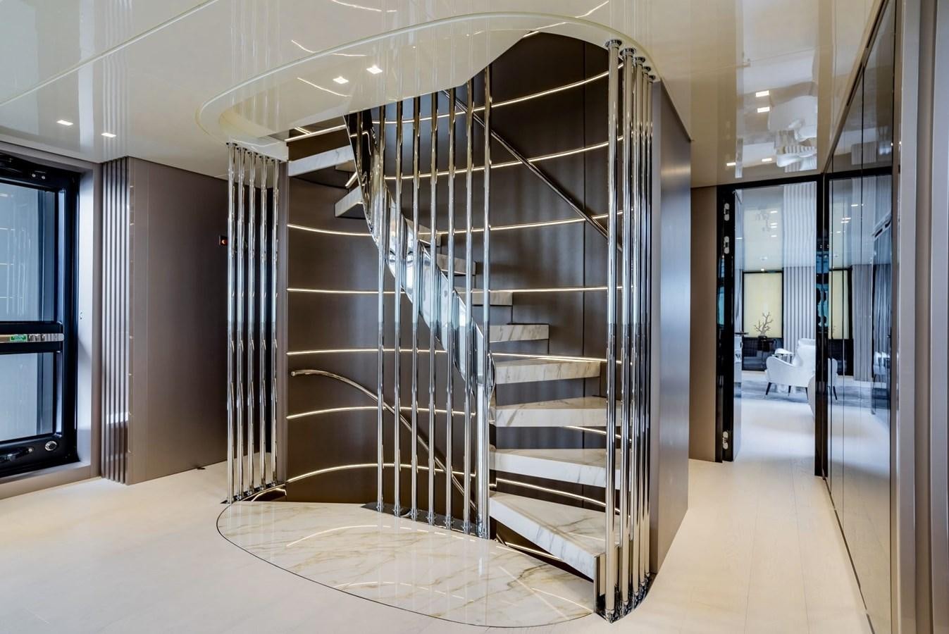 a large metal staircase in a building aboard TOGETHER Yacht for Sale