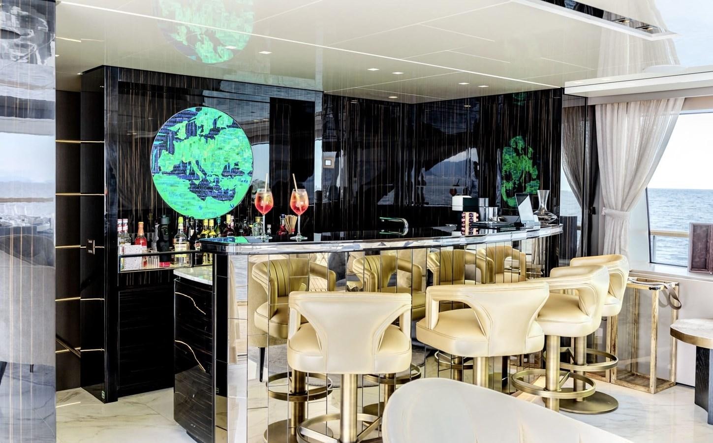 a room with a table and chairs aboard TOGETHER Yacht for Sale