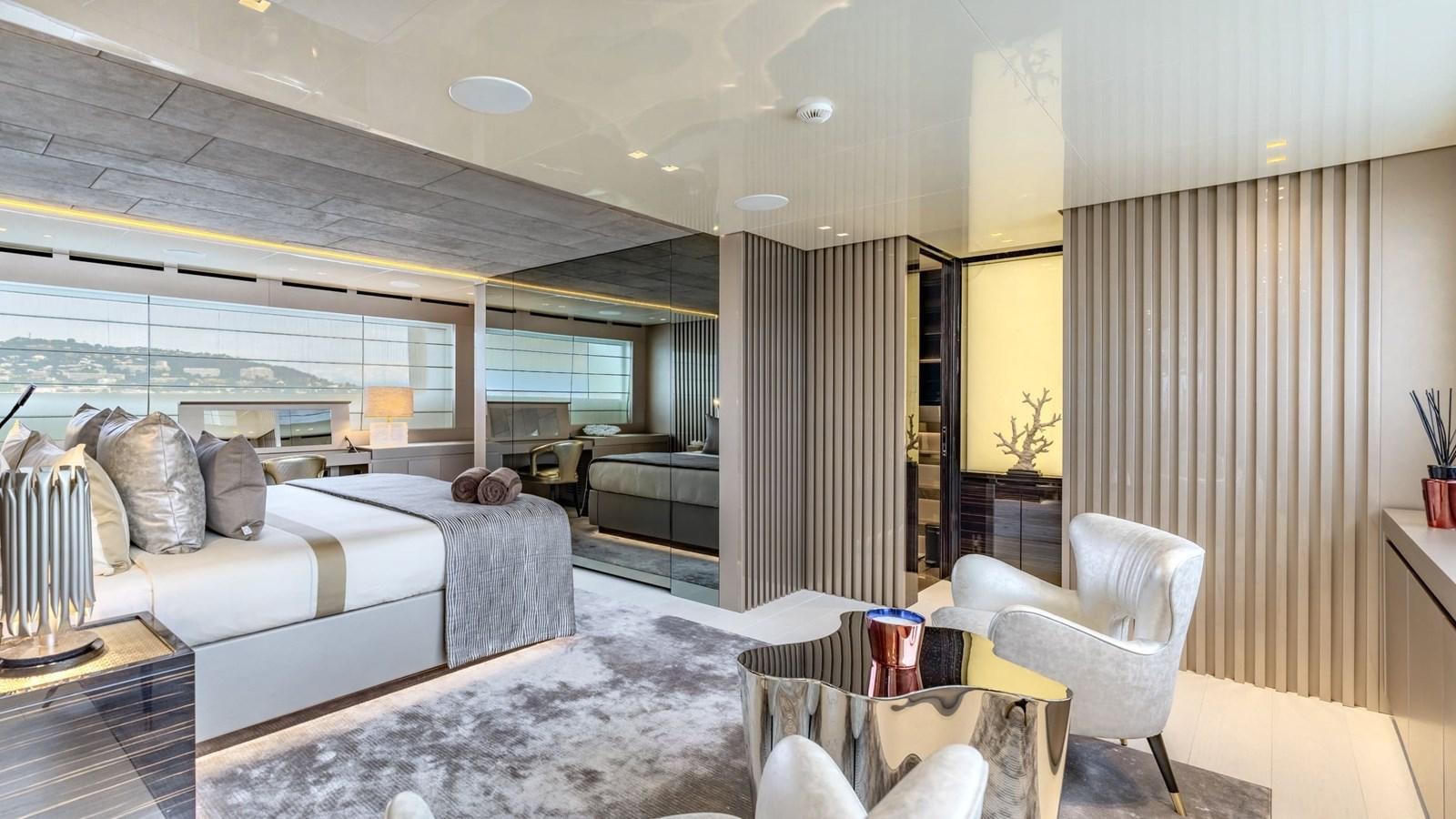 a large living room with a large window aboard TOGETHER Yacht for Sale