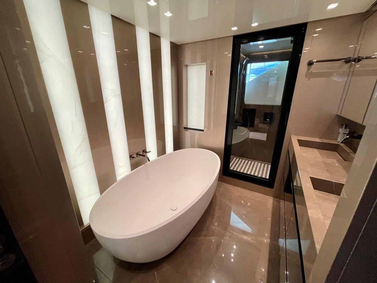 a bathroom with a large mirror aboard TOGETHER Yacht for Sale