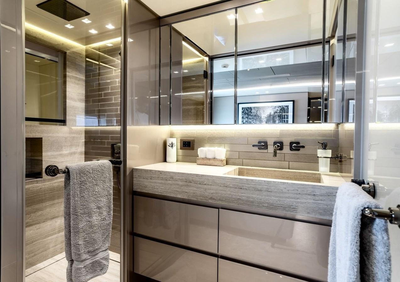 a bathroom with a glass shower aboard TOGETHER Yacht for Sale