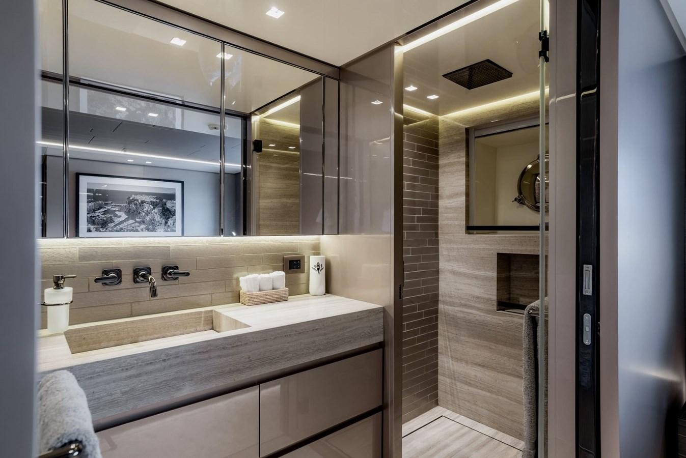 a bathroom with a large mirror aboard TOGETHER Yacht for Sale