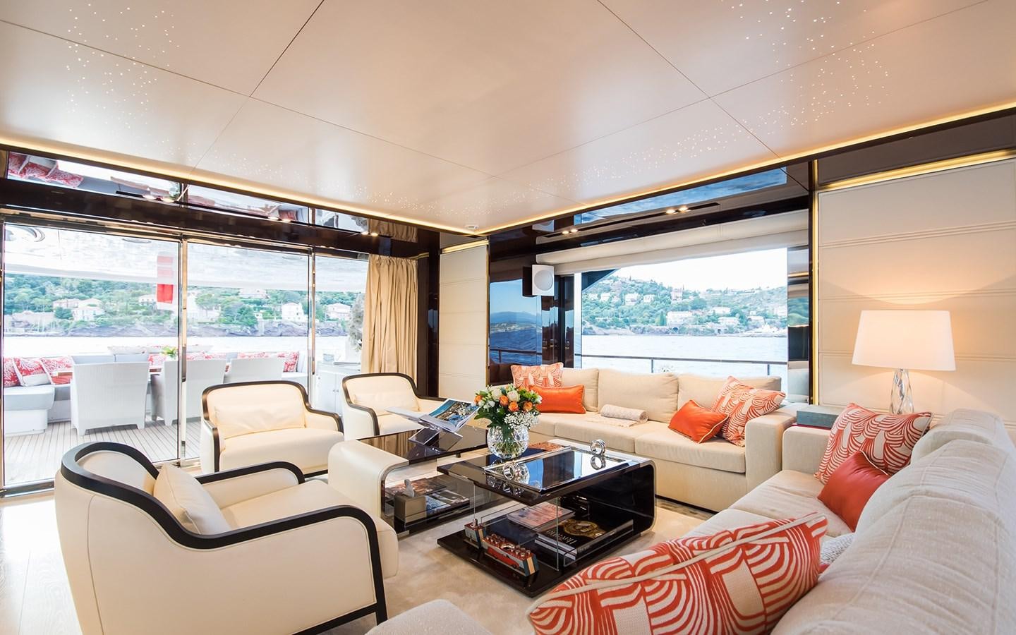 a living room with a large window aboard SOULMATE Yacht for Sale