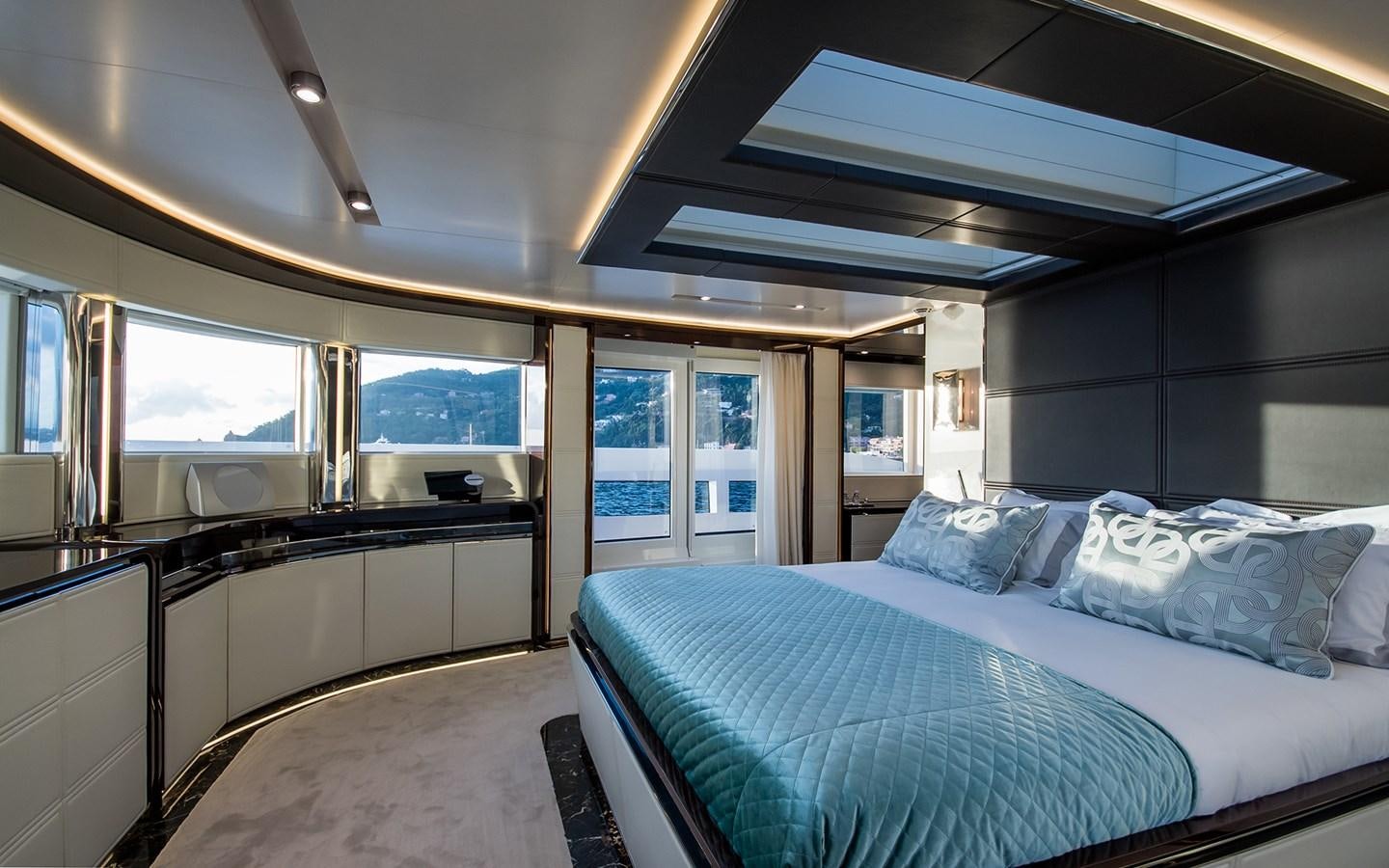 a room with a bed and a window aboard SOULMATE Yacht for Sale