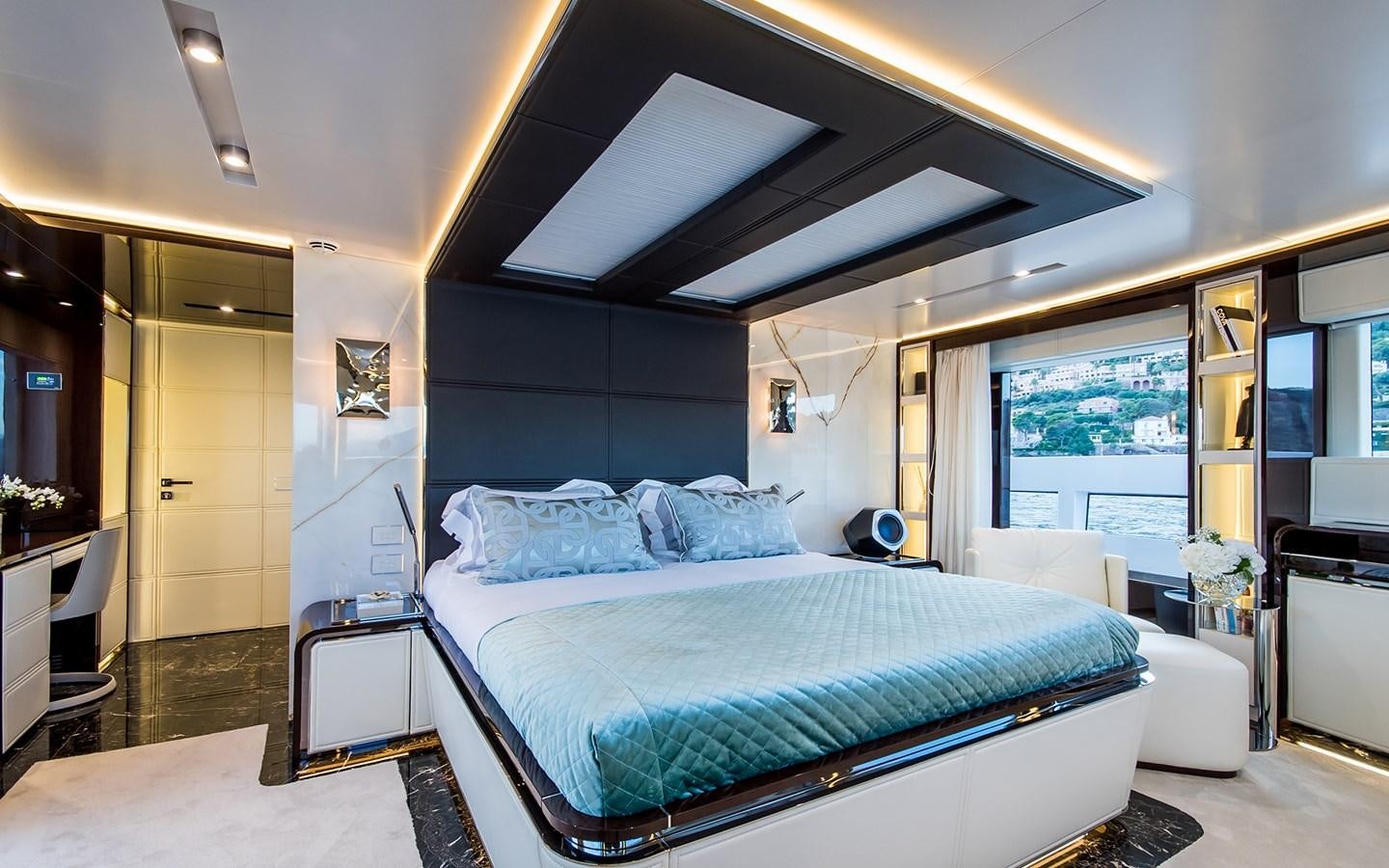 a bedroom with a large bed aboard SOULMATE Yacht for Sale