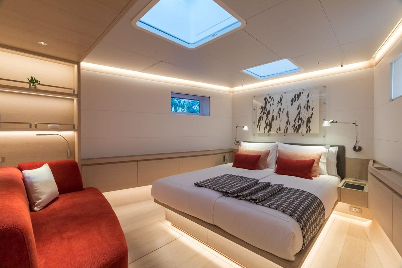 a bed in a room aboard CERVO Yacht for Sale