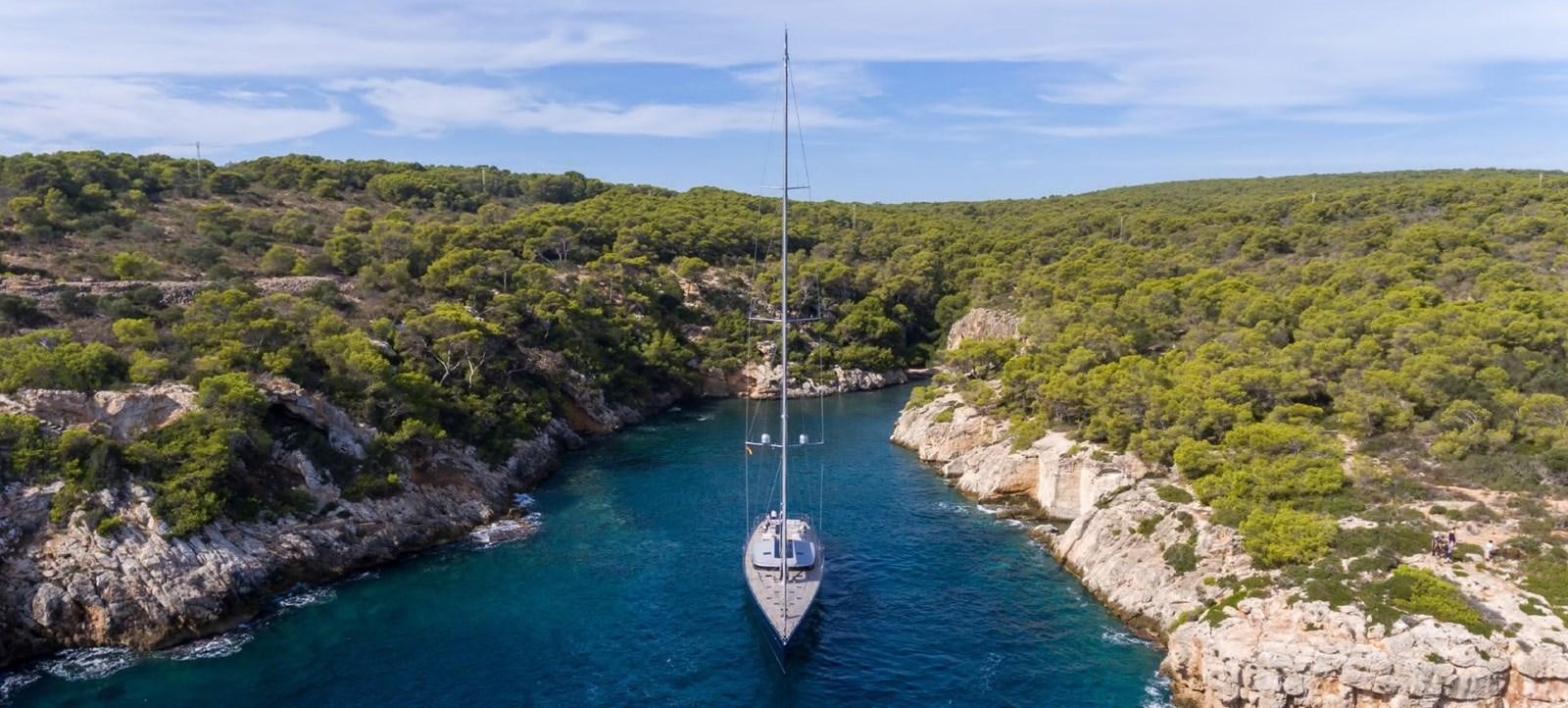 a boat sailing on a river aboard CERVO Yacht for Sale