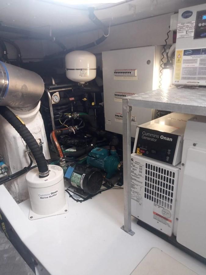 a machine with a large metal cylinder aboard PRIVE Yacht for Sale