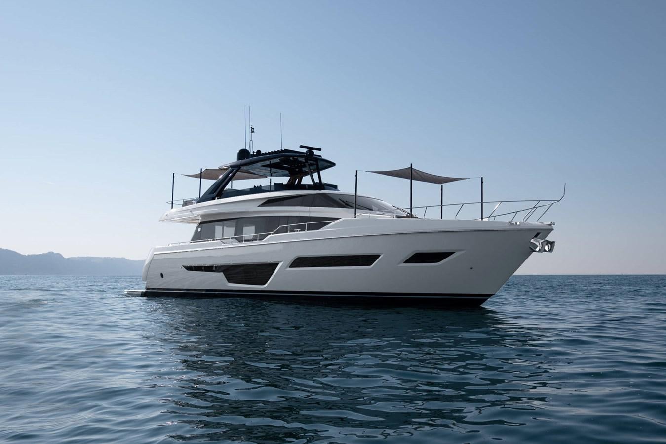 a white yacht in the water aboard 5 PALMS Yacht for Sale
