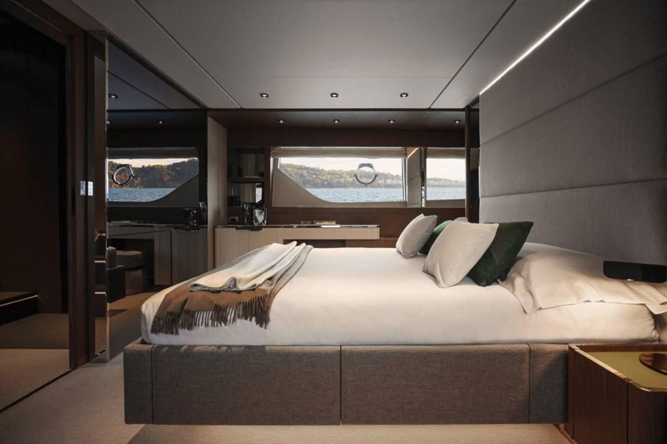 a bed in a room aboard 5 PALMS Yacht for Sale