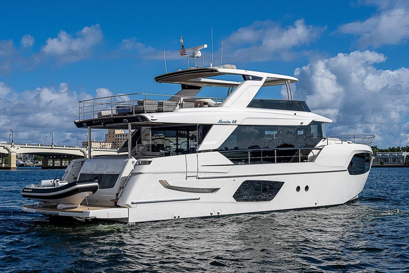 a white yacht in the water aboard 68 NAVETTA  Yacht for Sale