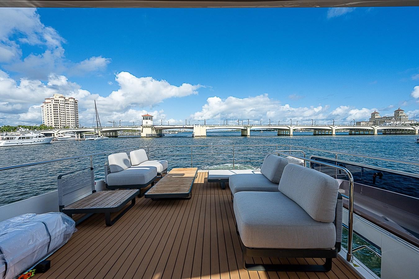a deck with chairs on it aboard 68 NAVETTA  Yacht for Sale