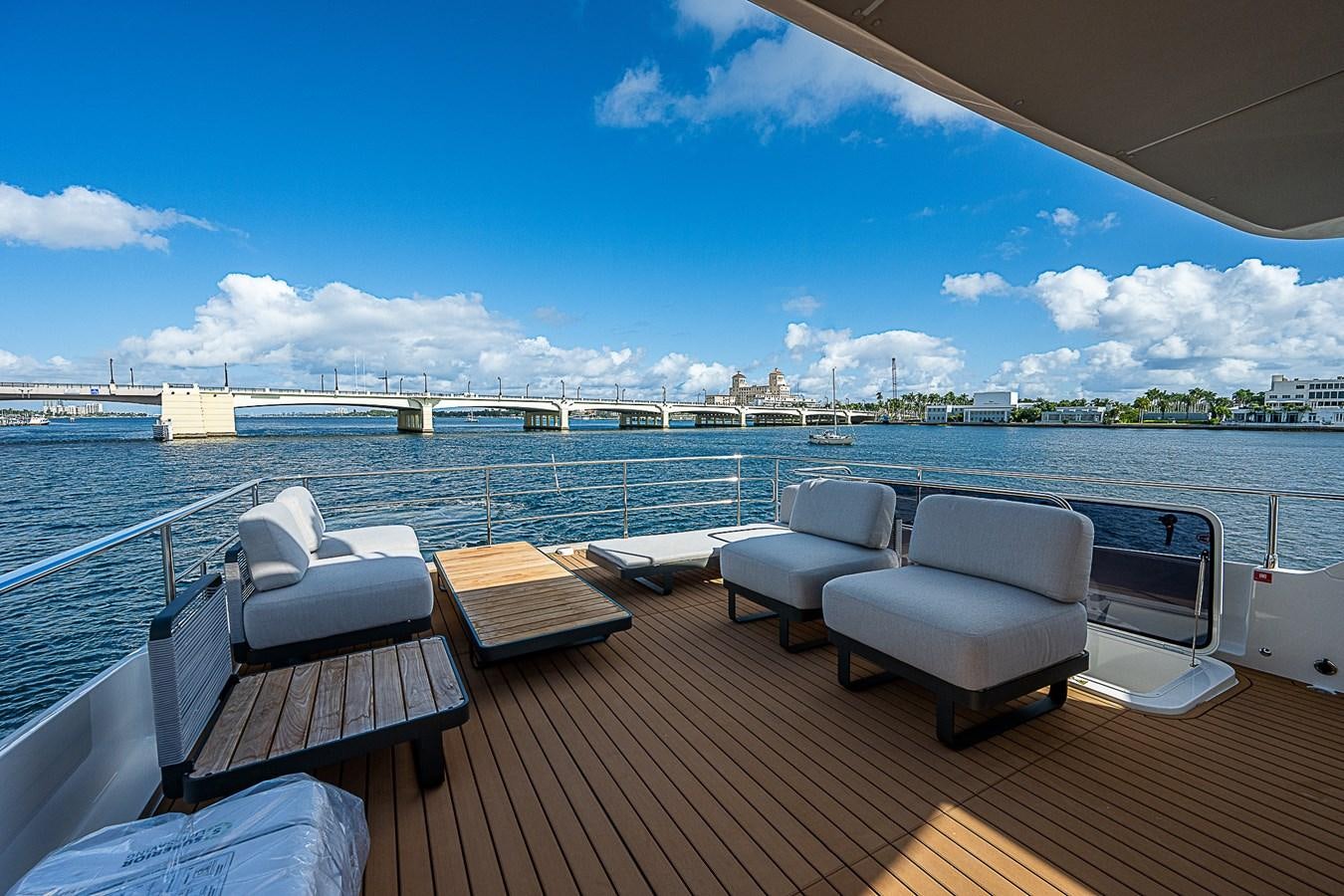 a deck with a view of a city and water aboard 68 NAVETTA  Yacht for Sale