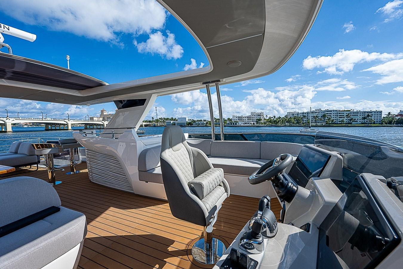 a boat with a deck and chairs aboard 68 NAVETTA  Yacht for Sale