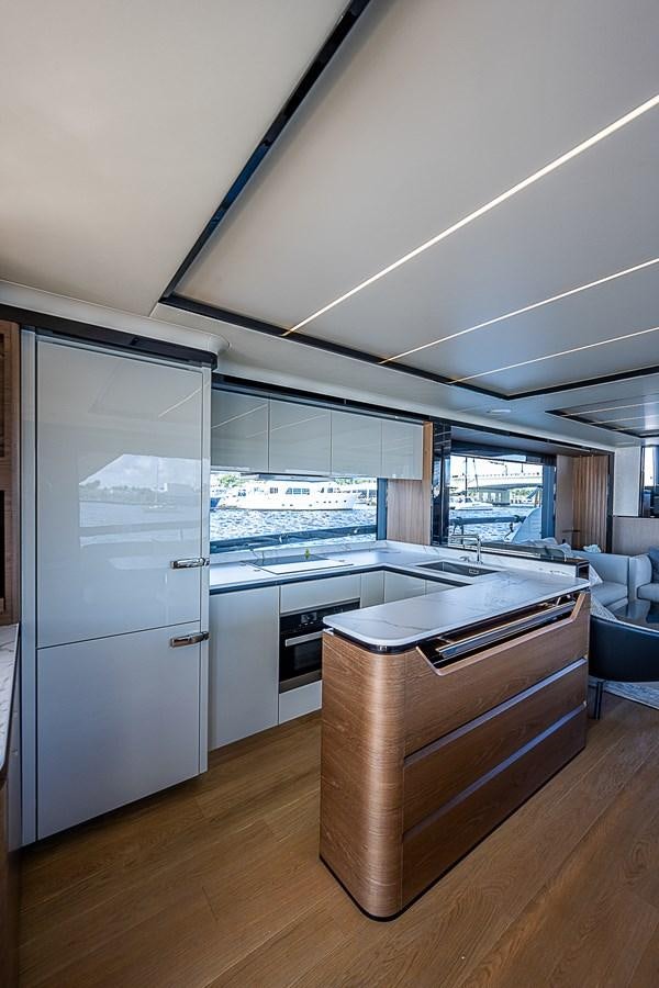 a kitchen with a large glass window aboard 68 NAVETTA  Yacht for Sale