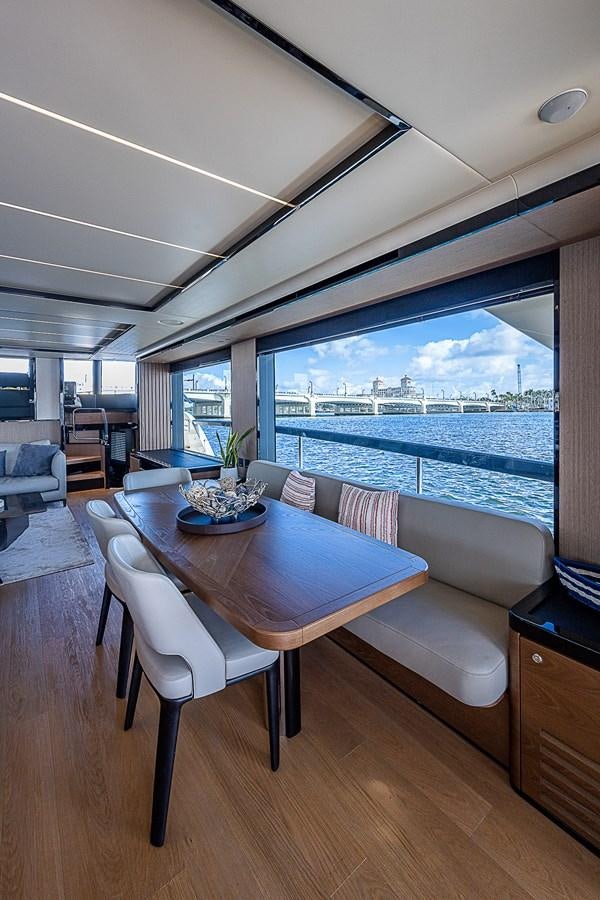 a dining table in a room aboard 68 NAVETTA  Yacht for Sale