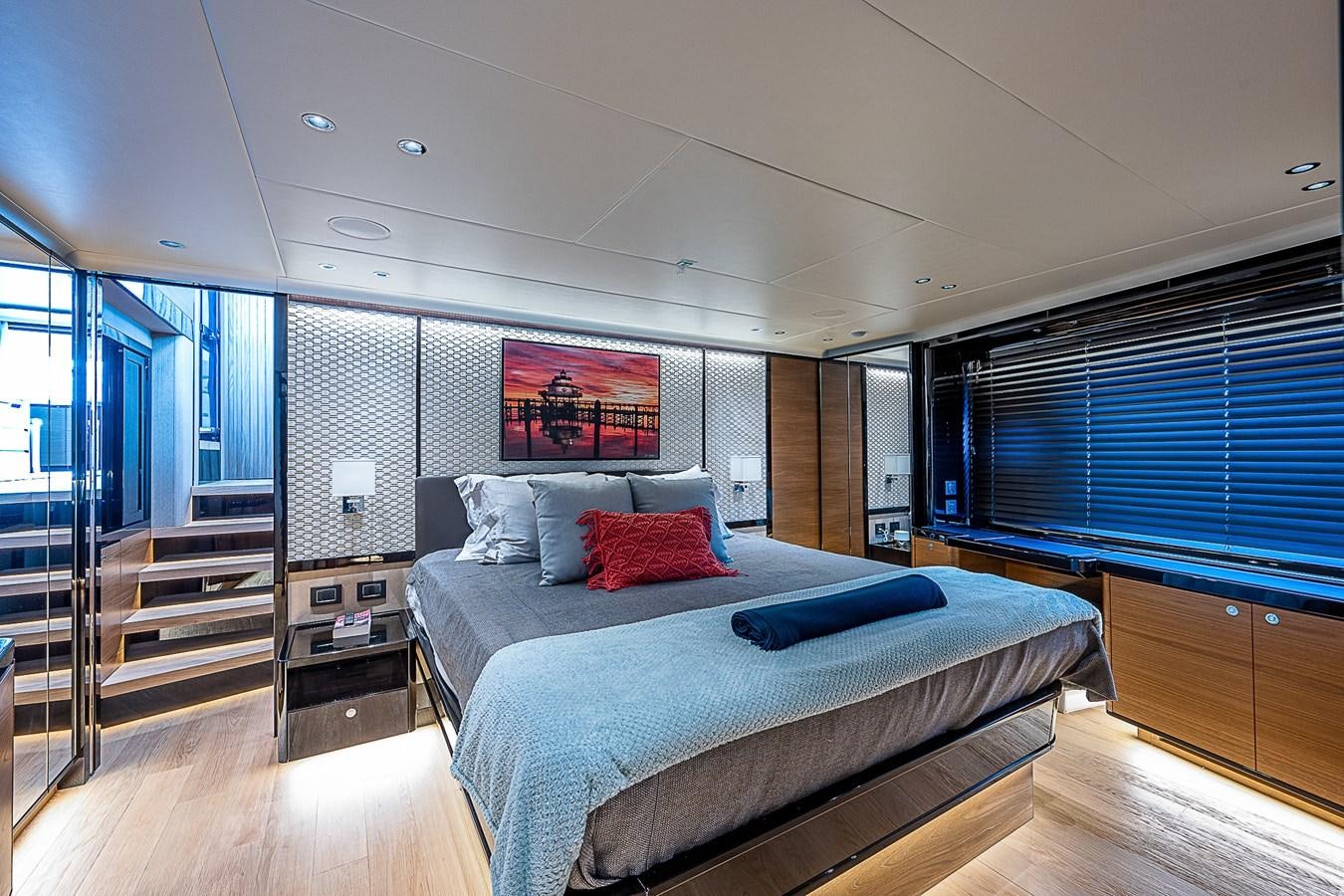 a large bedroom with a large bed aboard 68 NAVETTA  Yacht for Sale