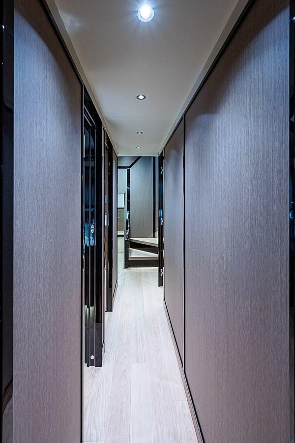 a hallway with doors aboard 68 NAVETTA  Yacht for Sale