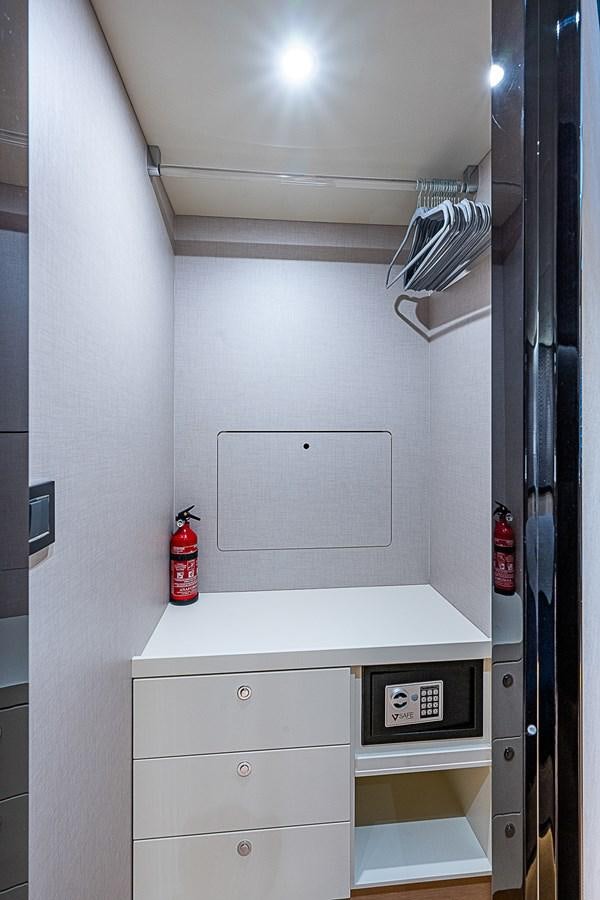 a black cabinet with a red beverage can on it aboard 68 NAVETTA  Yacht for Sale