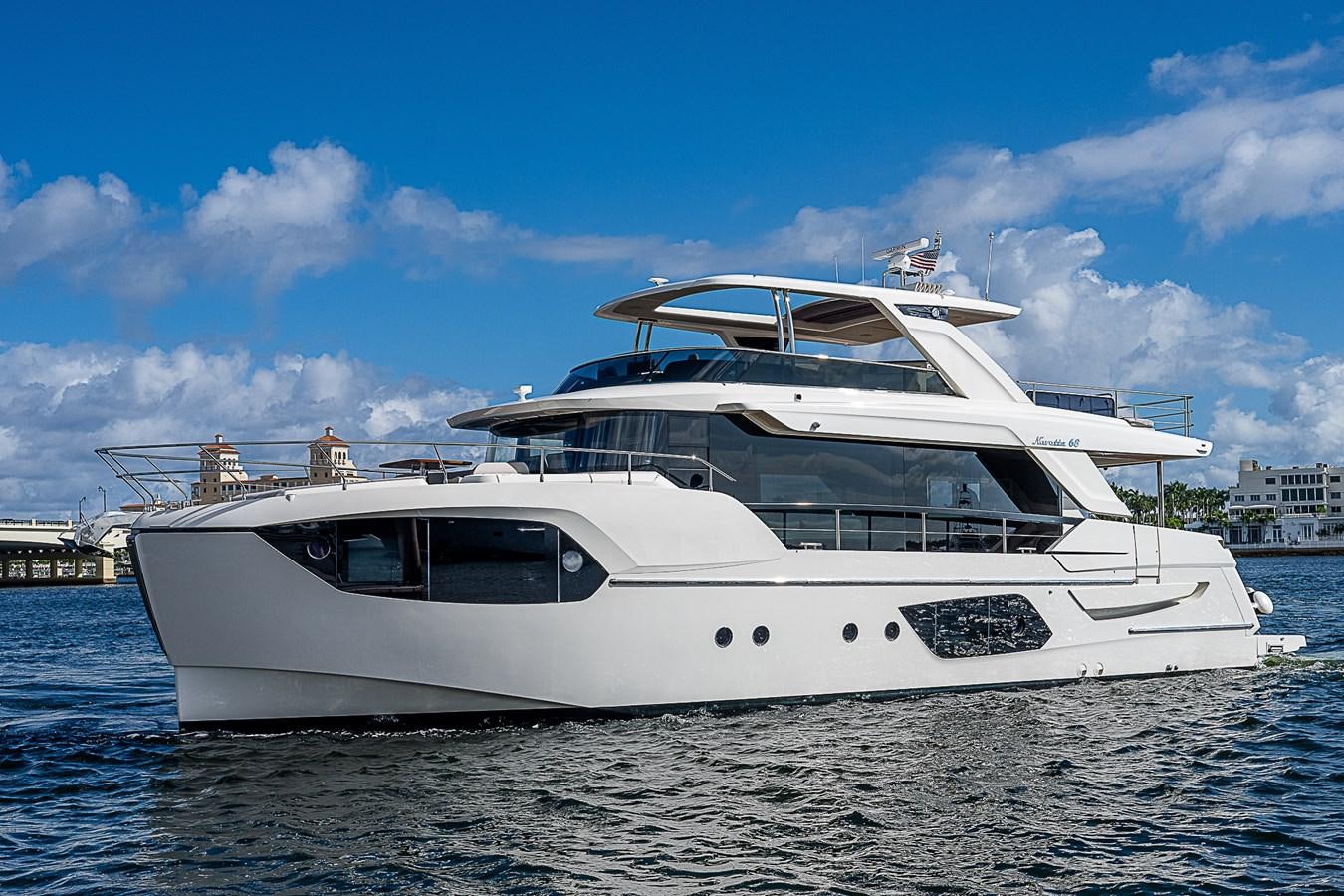 a white yacht in the water aboard 68 NAVETTA  Yacht for Sale