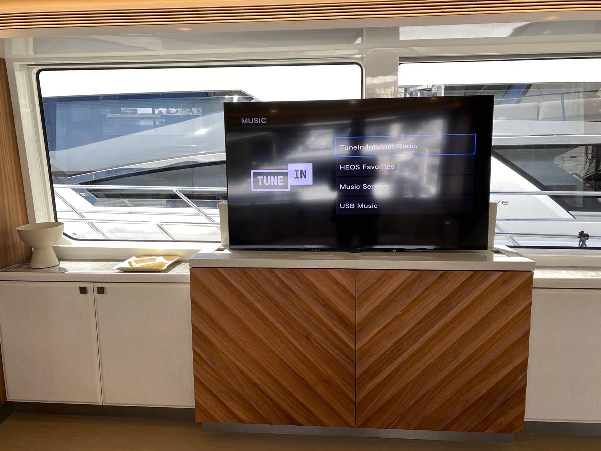 a large computer monitor on a counter aboard CLB72 Yacht for Sale
